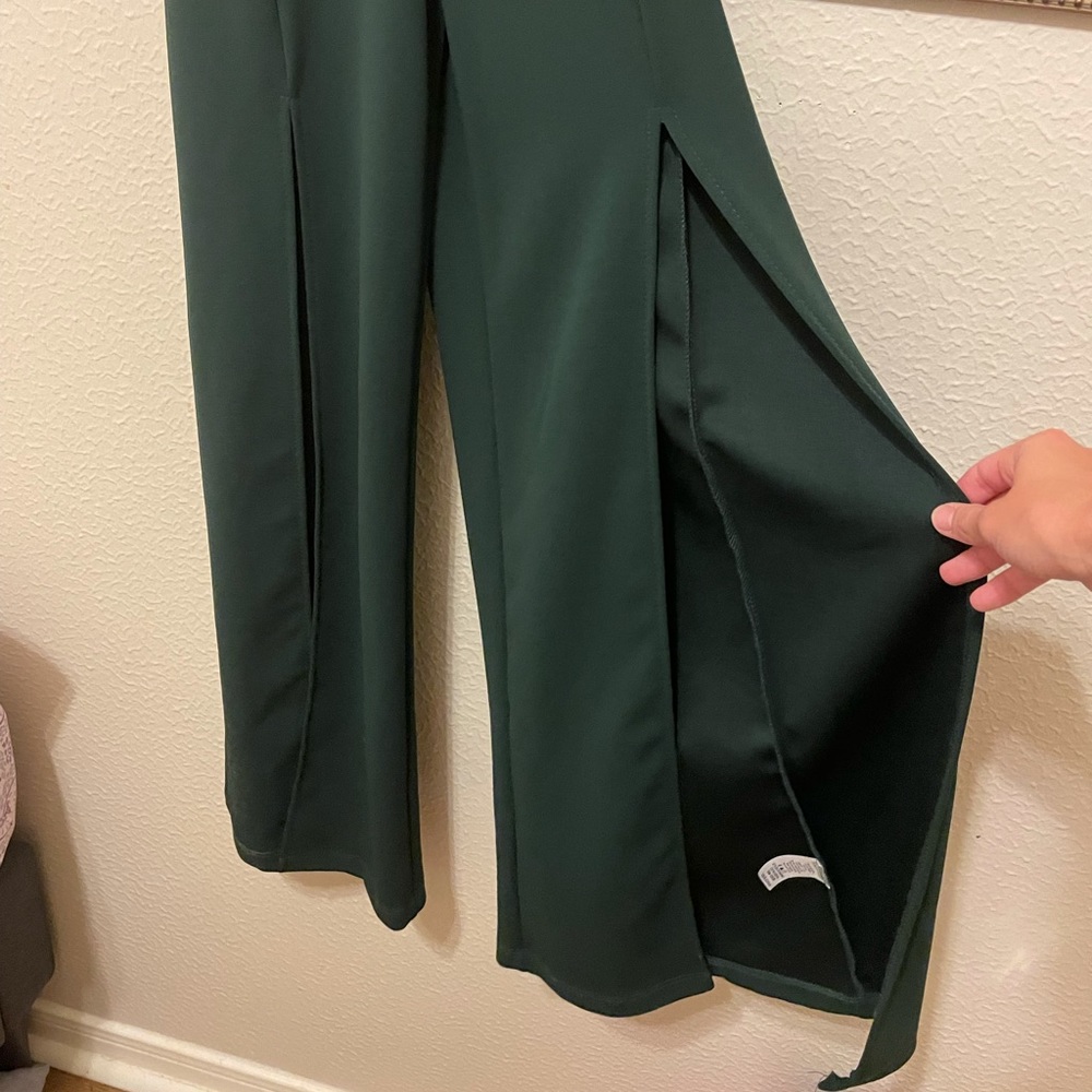 EX BOYFRIEND SALE. MUST GO!!! Dark green jumpsuit with splits on both pant legs